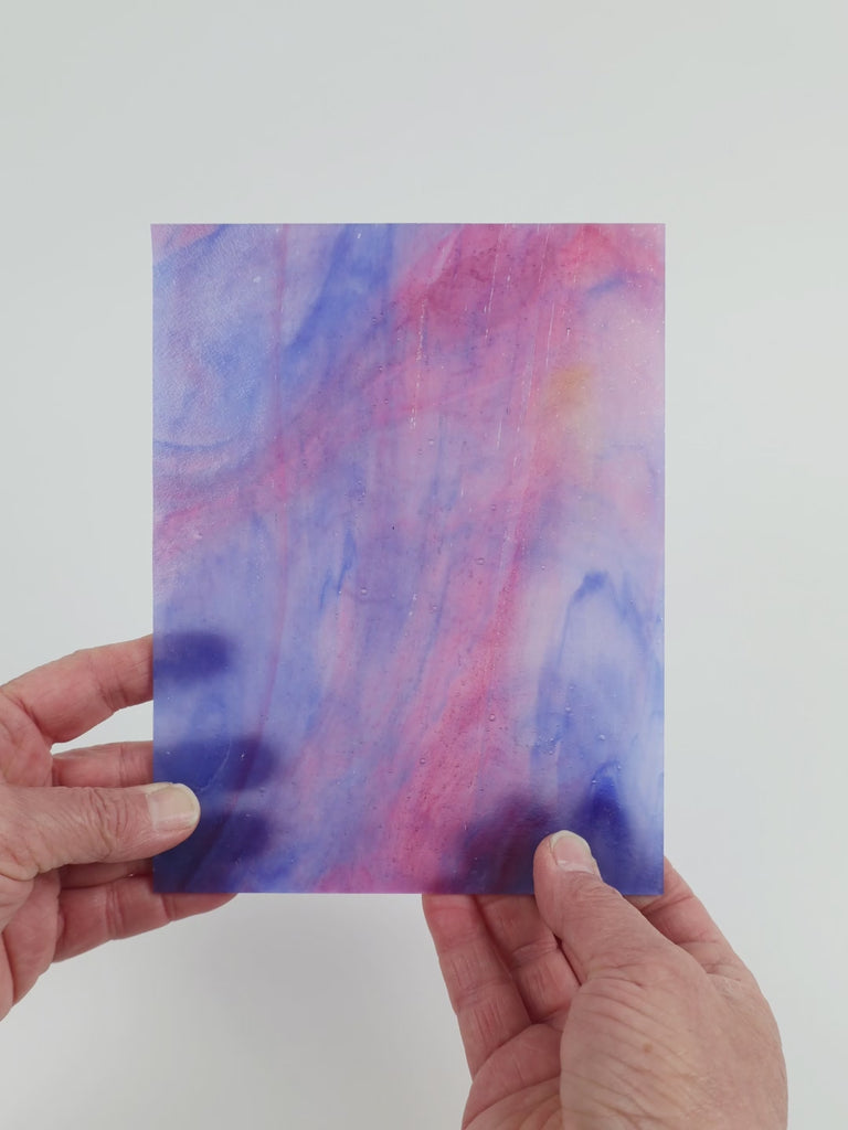 Video of the Very berry glass plate in translucent purple, 15x19cm, held up and tilted to show its pattern and transparency